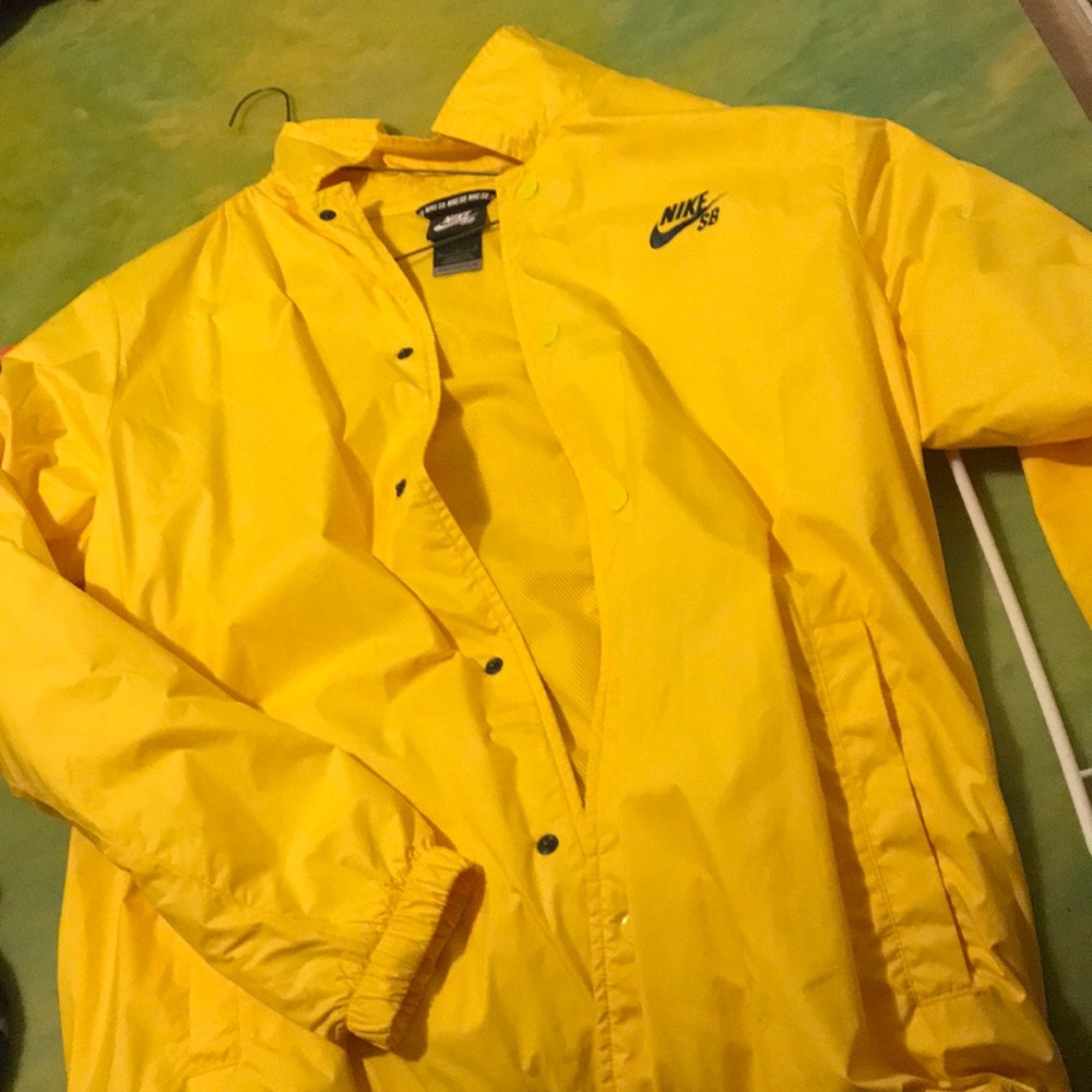 Yellow men and women’s Nike light weight jacket